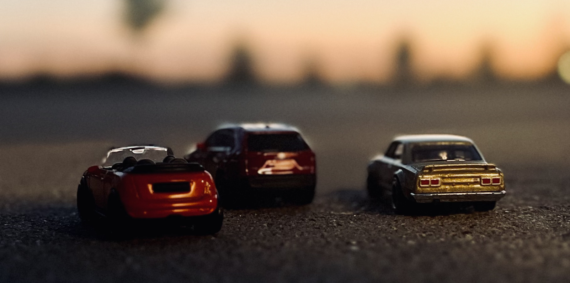 Three toy cars